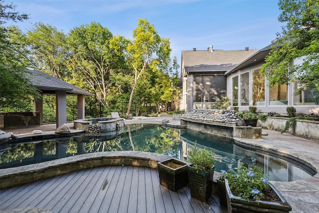 6617 Shady Creek Cir, Plano, TX 75024 - deck with a sunroom and a pool with connected hot tub