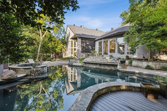 6617 Shady Creek Cir, Plano, TX 75024 - view of swimming pool with a sunroom and a pool with connected hot tub