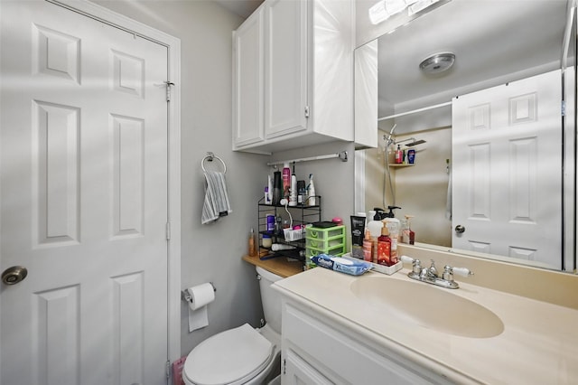 2701 Mims St, Fort Worth, TX 76112 - bathroom featuring vanity, toilet, and a shower