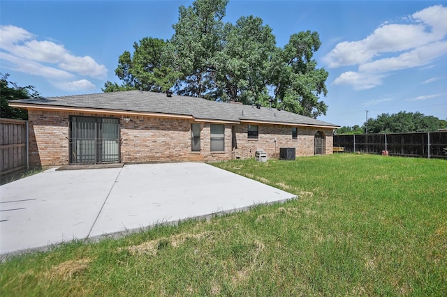 2701 Mims St, Fort Worth, TX 76112 - rear view of property with cooling unit, a patio, and brick siding