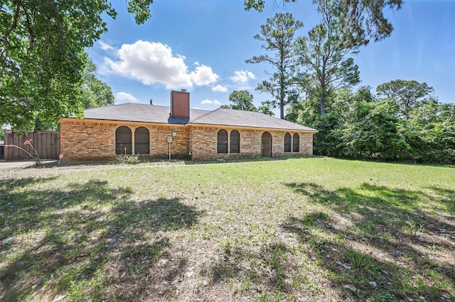 2701 Mims St, Fort Worth, TX 76112 - rear view of property with a chimney and brick siding