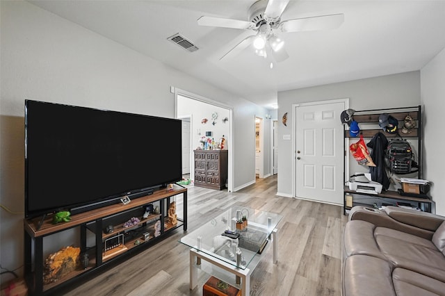 2701 Mims St, Fort Worth, TX 76112 - living area featuring ceiling fan, light wood-type flooring, and baseboards