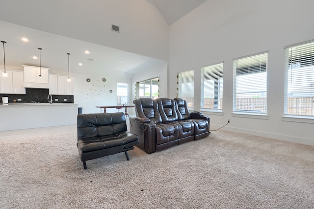 108 Laverna Ln, Hickory Creek, TX 75065 - living area with light colored carpet, high vaulted ceiling, and recessed lighting