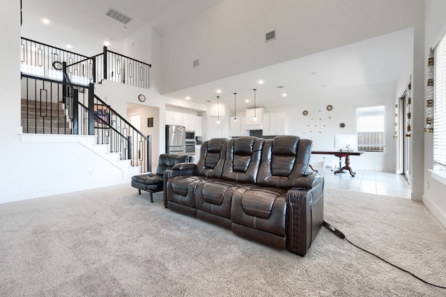 108 Laverna Ln, Hickory Creek, TX 75065 - living area with light colored carpet, a high ceiling, stairway, recessed lighting, and baseboards
