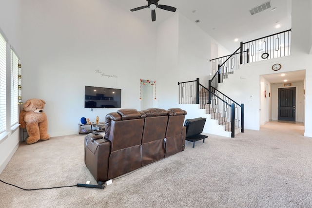 108 Laverna Ln, Hickory Creek, TX 75065 - carpeted living area featuring high vaulted ceiling, a ceiling fan, stairs, and baseboards