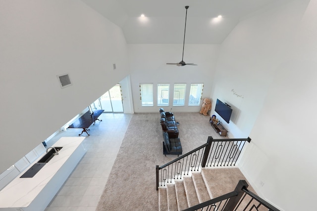 108 Laverna Ln, Hickory Creek, TX 75065 - carpeted living area with high vaulted ceiling and a ceiling fan