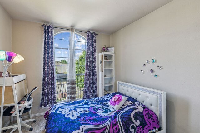 5736 New Castle Dr, Richardson, TX 75082 - carpeted bedroom featuring baseboards