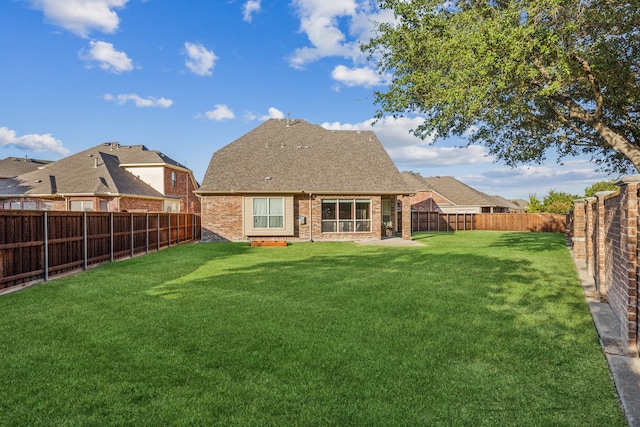 5736 New Castle Dr, Richardson, TX 75082 - rear view of property with a shingled roof and brick siding