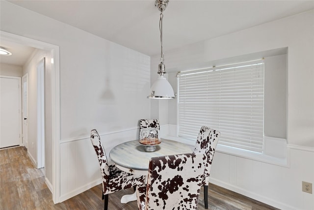 1603 Versailles Dr, Richardson, TX 75081 - dining space with wainscoting, wood finished floors, and a decorative wall
