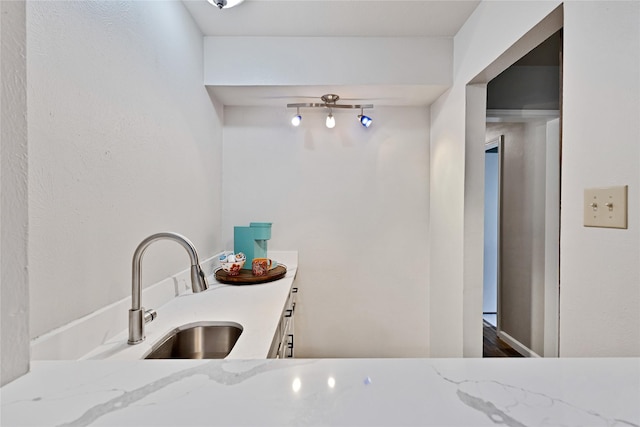 1603 Versailles Dr, Richardson, TX 75081 - kitchen featuring a sink and light stone countertops