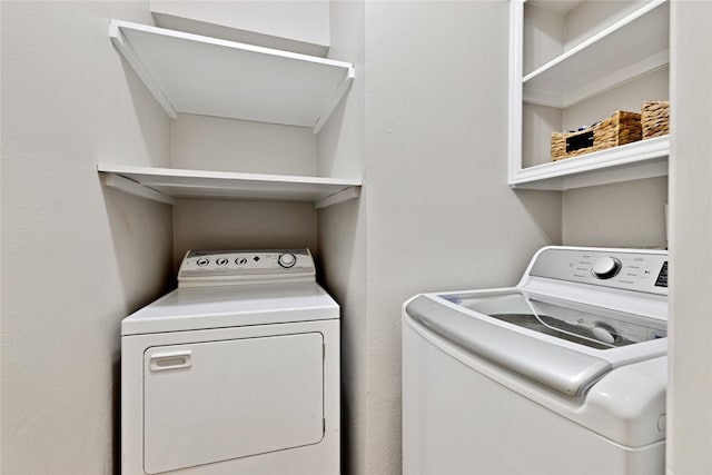 1603 Versailles Dr, Richardson, TX 75081 - washroom with washing machine and dryer