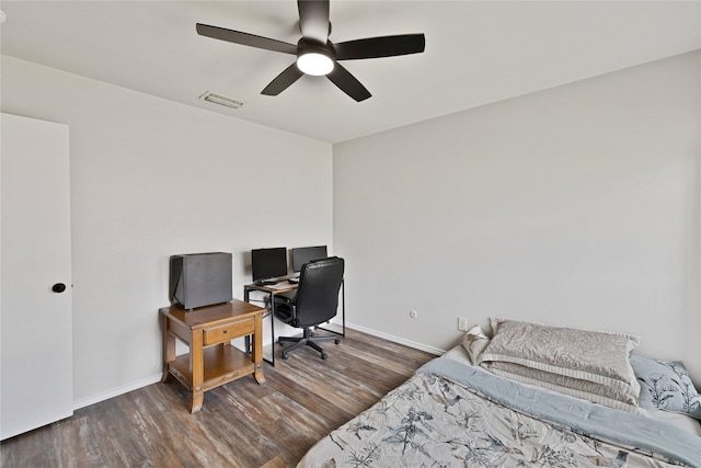 1603 Versailles Dr, Richardson, TX 75081 - bedroom with a desk, wood finished floors, baseboards, and a ceiling fan