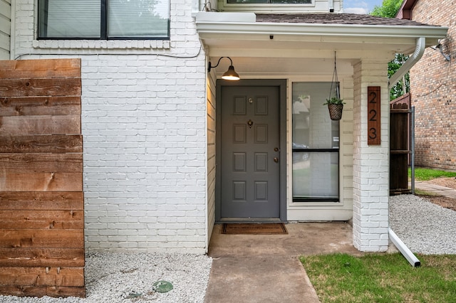223 Mccarley Pl, Mckinney, TX 75071 - doorway to property with brick siding