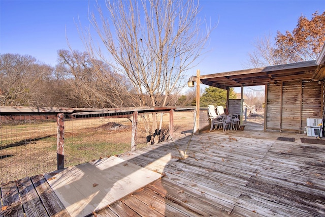 691 Bear Rd, Van Alstyne, TX 75495 - wooden terrace with outdoor dining space