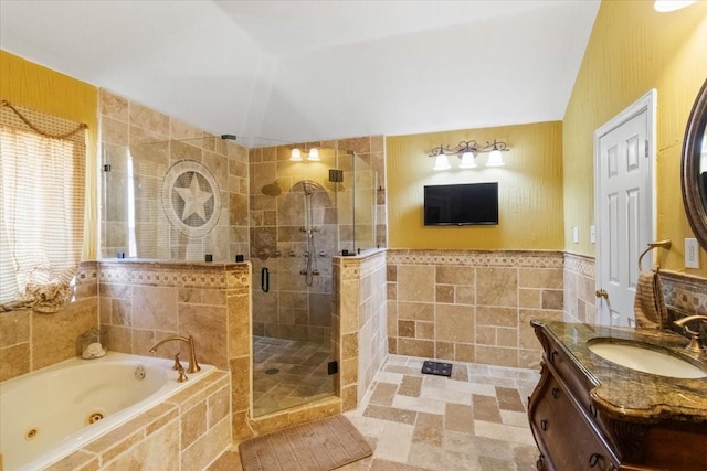 810 W Lonesome Dove Trl, Arlington, TX 76001 - full bath featuring tile walls, a tub with jets, vanity, and a stall shower