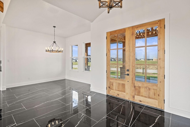 10611 Millet Ln, Venus, TX 76084 - entrance foyer featuring a chandelier, baseboards, and french doors