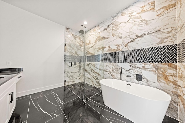 10611 Millet Ln, Venus, TX 76084 - bathroom featuring marble tiled flooring, a marble finish shower, a soaking tub, vanity, and baseboards