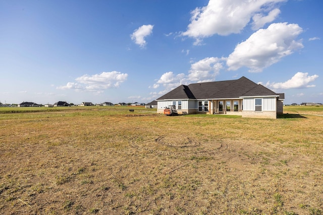 10611 Millet Ln, Venus, TX 76084 - rear view of property featuring a lawn