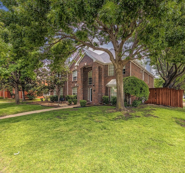 6720 Grant Ln, Plano, TX 75024 - colonial inspired home with brick siding