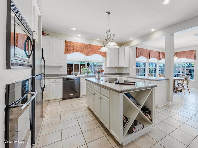 6720 Grant Ln, Plano, TX 75024 - kitchen with black appliances, light tile patterned flooring, healthy amount of natural light, and recessed lighting