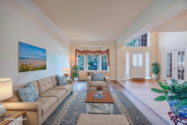 6720 Grant Ln, Plano, TX 75024 - living room featuring ornamental molding, wood finished floors, baseboards, and french doors