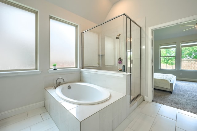 1733 Ann St, Celina, TX 75009 - ensuite bathroom with a bath, a shower stall, tile patterned flooring, baseboards, and lofted ceiling