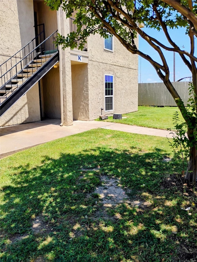 2840 Patricia Ln Unit 104, Garland, TX 75041 - view of building exterior featuring stairway