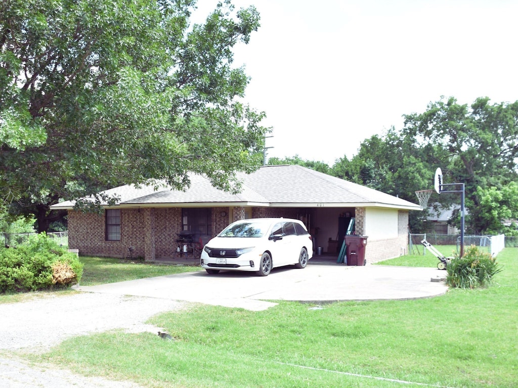 401 E Hunt St, Leonard, TX 75452 - view of home's exterior featuring concrete driveway