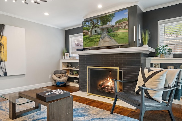 5308 Parkland Ave, Dallas, TX 75235 - living room with wood finished floors, healthy amount of natural light, a brick fireplace, baseboards, and ornamental molding