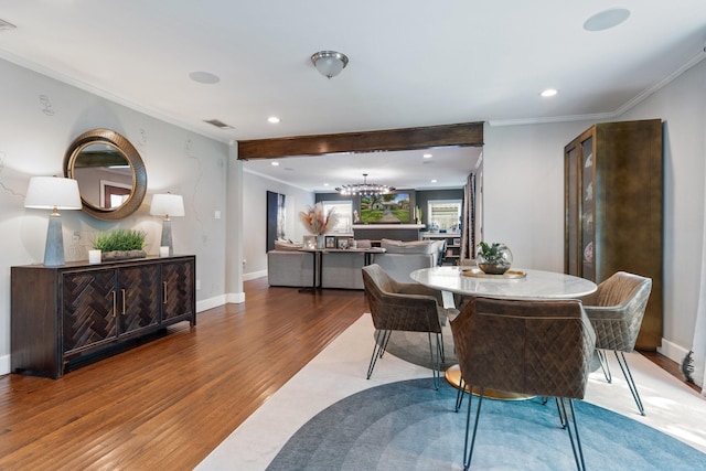 5308 Parkland Ave, Dallas, TX 75235 - dining room featuring wood finished floors, a chandelier, crown molding, recessed lighting, and baseboards