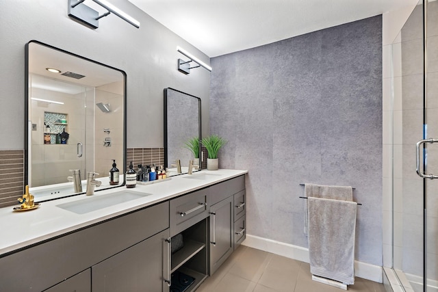 5308 Parkland Ave, Dallas, TX 75235 - bathroom featuring double vanity, a stall shower, and tile patterned floors