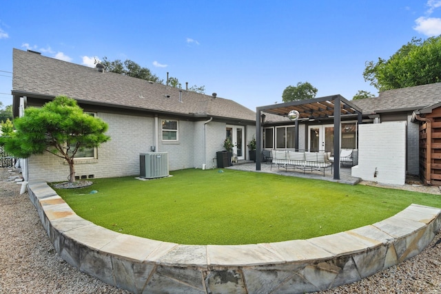 5308 Parkland Ave, Dallas, TX 75235 - back of property featuring central air condition unit, a pergola, a patio, and a lawn