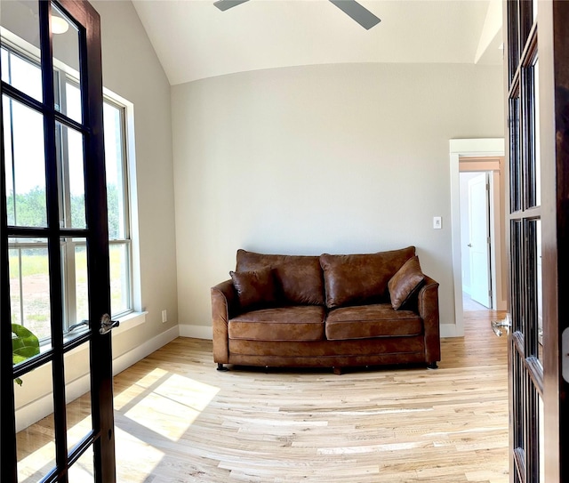 180 Cant Miss, Gordon, TX 76453 - living room featuring lofted ceiling, a ceiling fan, baseboards, light wood finished floors, and french doors