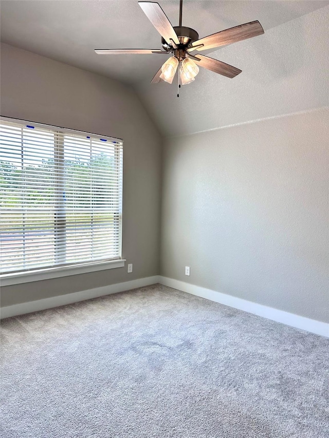 180 Cant Miss, Gordon, TX 76453 - empty room with carpet flooring, vaulted ceiling, baseboards, a ceiling fan, and a textured ceiling