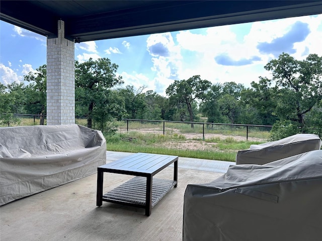 180 Cant Miss, Gordon, TX 76453 - view of patio with an outdoor living space and view of scattered trees