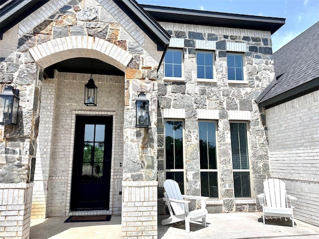 180 Cant Miss, Gordon, TX 76453 - view of exterior entry with stone siding