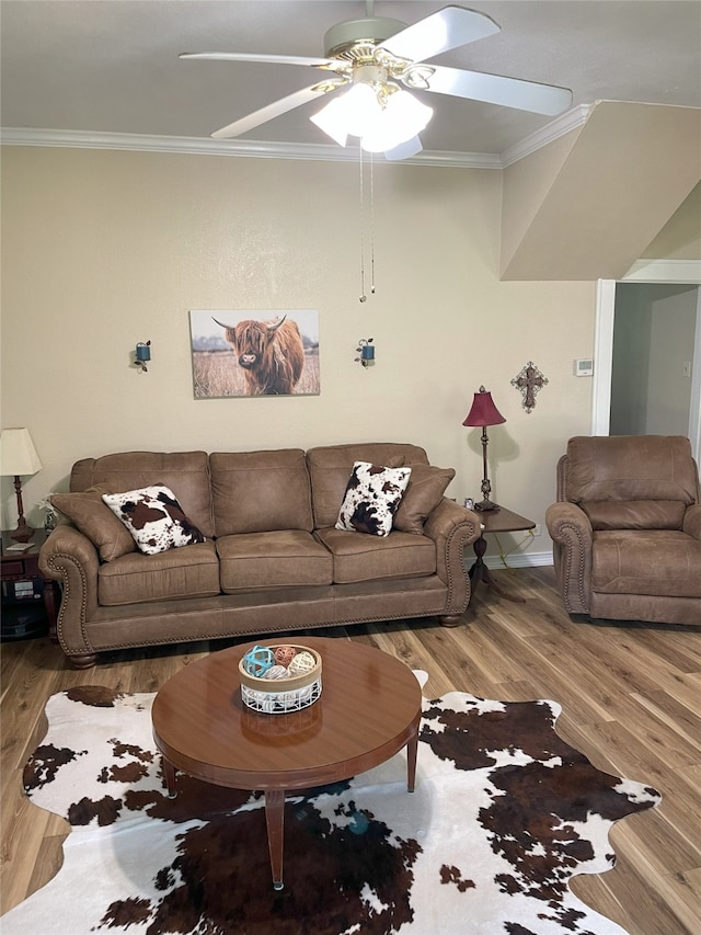 2620 County Road 1102, Grandview, TX 76050 - living area featuring a ceiling fan, ornamental molding, wood finished floors, and baseboards