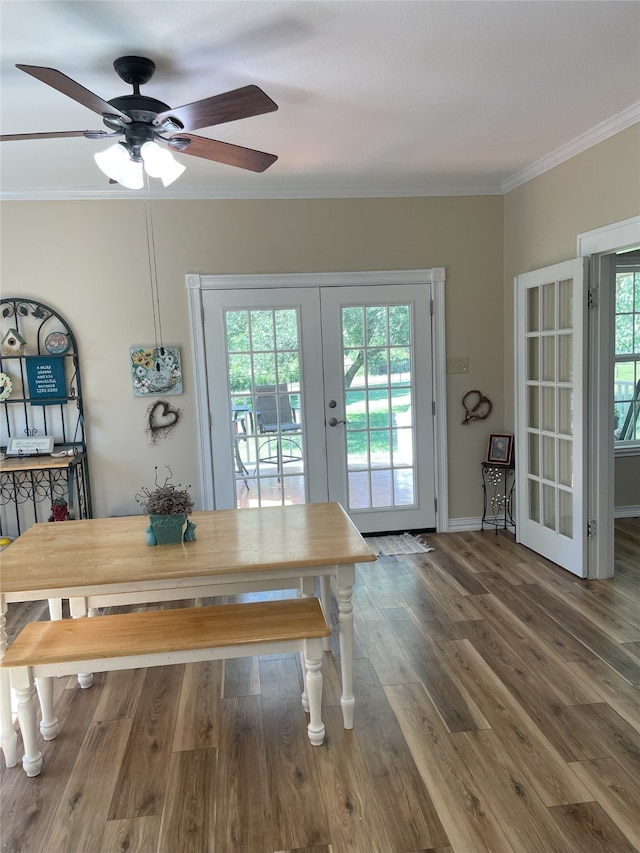 2620 County Road 1102, Grandview, TX 76050 - dining area featuring french doors, plenty of natural light, ornamental molding, a ceiling fan, and wood finished floors