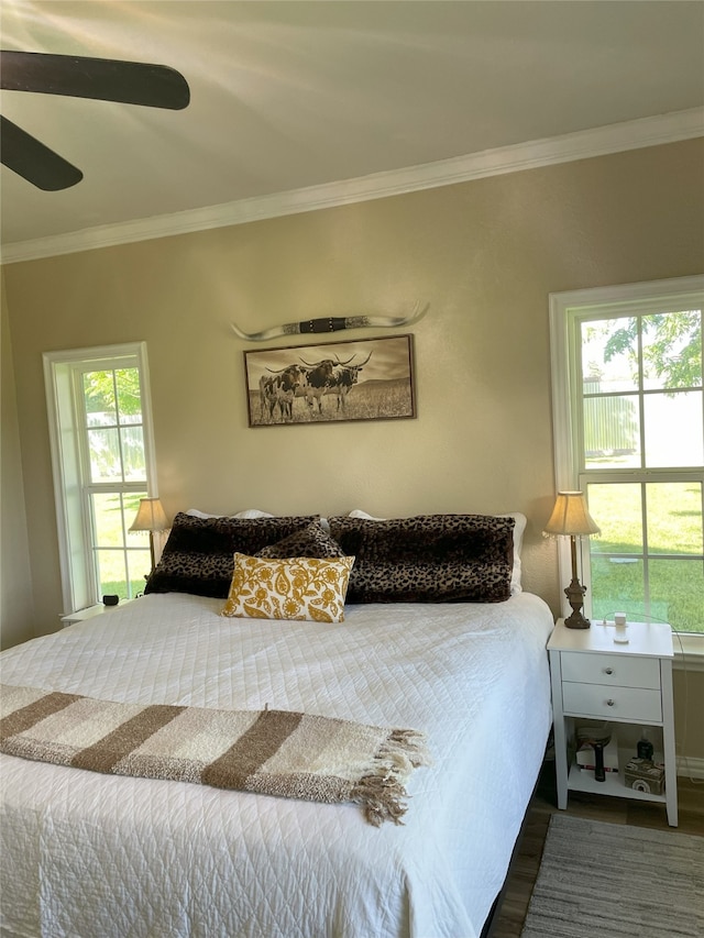 2620 County Road 1102, Grandview, TX 76050 - bedroom featuring ornamental molding, wood finished floors, and ceiling fan