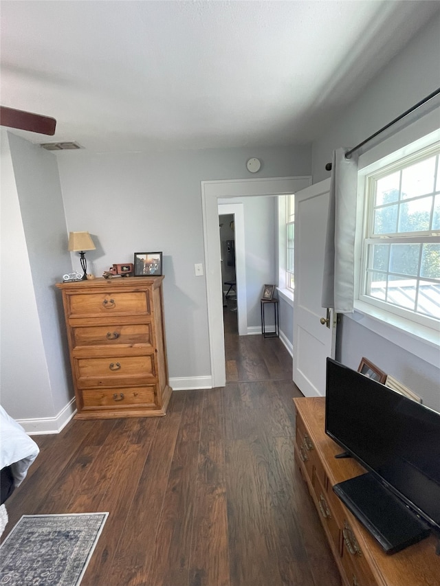 2620 County Road 1102, Grandview, TX 76050 - bedroom with dark wood finished floors and baseboards