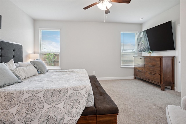 5213 Meadow Ln, Krum, TX 76249 - bedroom featuring light colored carpet, baseboards, and ceiling fan