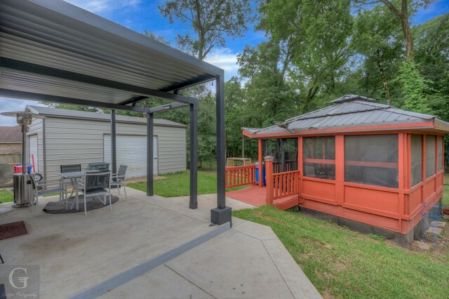 4002 Wilderness Ln, Bossier City, LA 71111 - view of patio with an outbuilding, a gazebo, and outdoor dining area