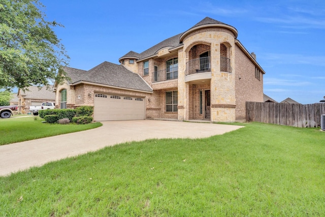 417 Sagebrush Ln, Waxahachie, TX 75165 - french country home featuring brick siding, a garage, a balcony, driveway, and central air condition unit