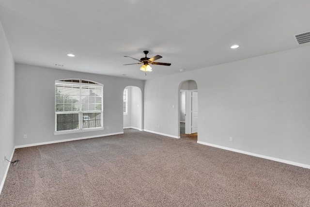 417 Sagebrush Ln, Waxahachie, TX 75165 - carpeted spare room featuring arched walkways, ceiling fan, baseboards, and recessed lighting