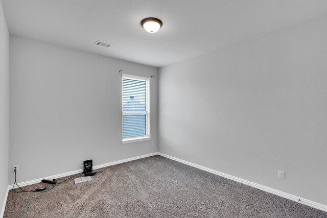 417 Sagebrush Ln, Waxahachie, TX 75165 - empty room with carpet floors and baseboards