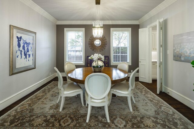 2900 Amherst Ave, University Park, TX 75225 - dining area with a chandelier, healthy amount of natural light, dark wood finished floors, baseboards, and ornamental molding