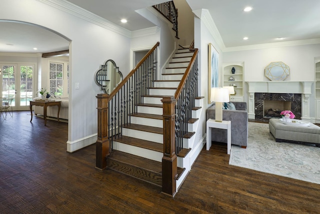 2900 Amherst Ave, University Park, TX 75225 - stairs with arched walkways, wood finished floors, crown molding, recessed lighting, and a premium fireplace