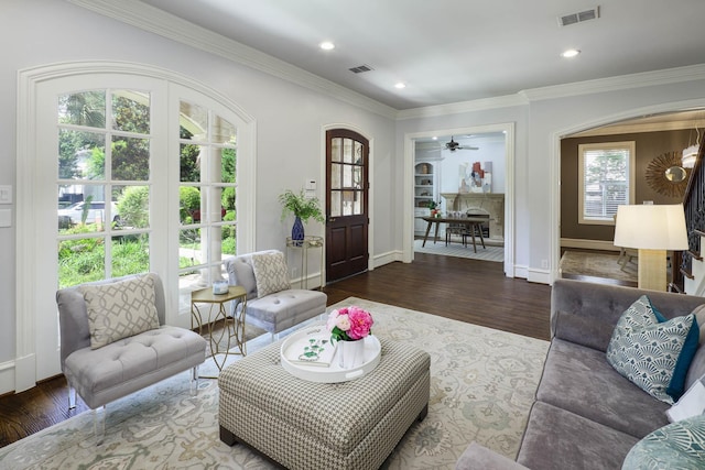 2900 Amherst Ave, University Park, TX 75225 - living room featuring wood finished floors, plenty of natural light, baseboards, crown molding, and ceiling fan