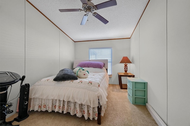 115 Candlewood Cir, Gainesville, TX 76240 - bedroom with a textured ceiling, crown molding, carpet flooring, a ceiling fan, and lofted ceiling