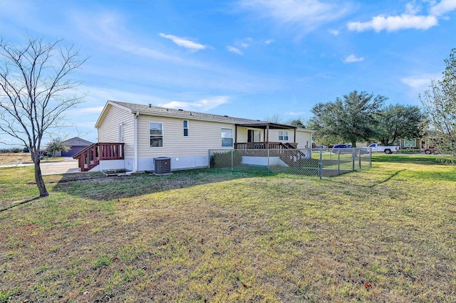 115 Candlewood Cir, Gainesville, TX 76240 - back of house with central air condition unit and a deck